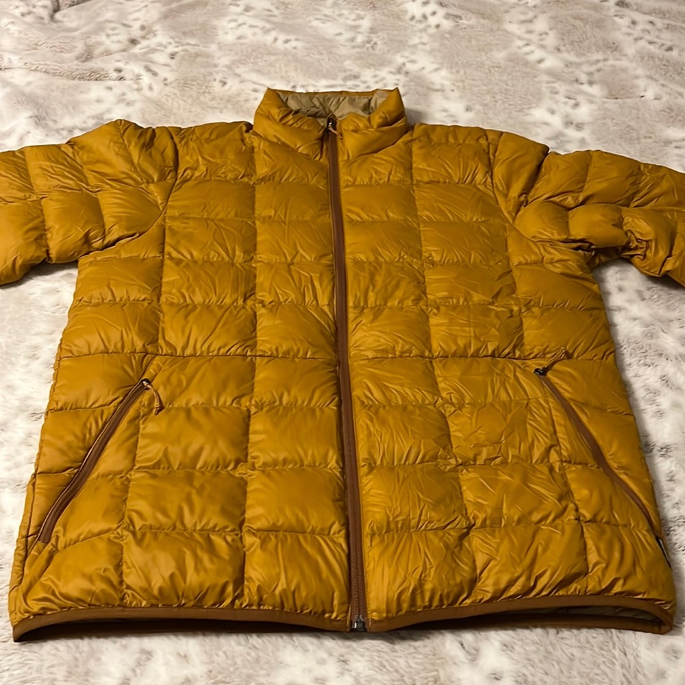 Puffy down travel jacket